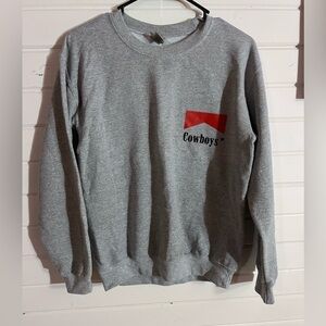 Woman’s boutique cowboy sweater